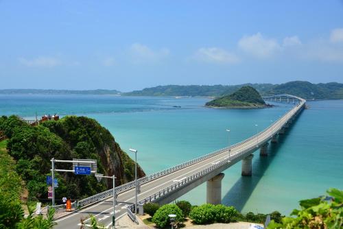 a bridge over a body of water at HOTEL MYTH-Resort -ホテル マイス リゾート- adult only in Nagato