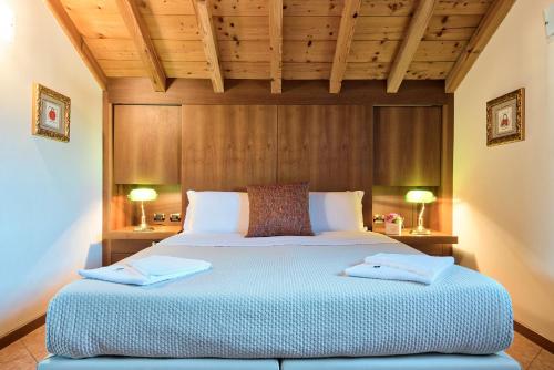 Cama ou camas em um quarto em Albergo Villa Priula
