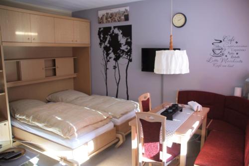 Un ou plusieurs lits dans un hébergement de l'établissement FeWo Milan Oberstaufen-Steibis