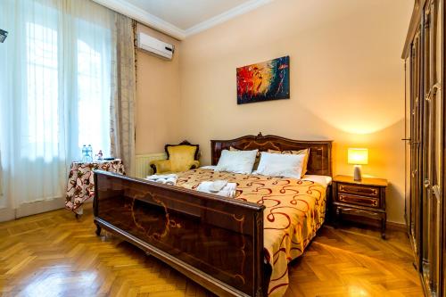 Postel nebo postele na pokoji v ubytování V Park Hotel