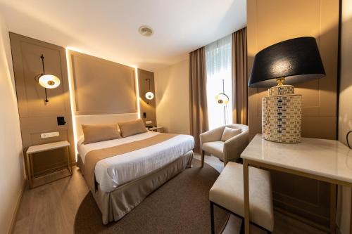 Кровать или кровати в номере Hotel Casablanca