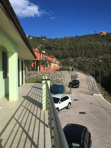 a white car parked on the balcony of a house at VILLA DEGLI ULIVI in Chiavari