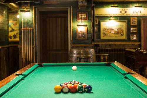 a pool table with a cue ball in a pub at Hotel Màgic La Massana by Nexta in La Massana
