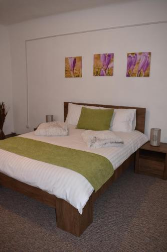 Кровать или кровати в номере Apartament Zimbru
