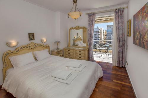 Ένα ή περισσότερα κρεβάτια σε δωμάτιο στο Nice Sea View Elegant Apartment