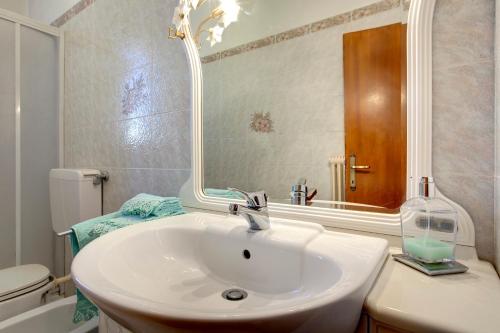 Ванна кімната в Appartamento Alfanihouse