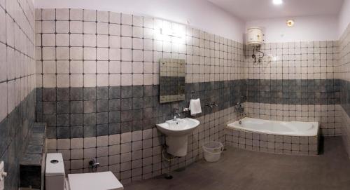 Kylpyhuone majoituspaikassa Udee's Homestay
