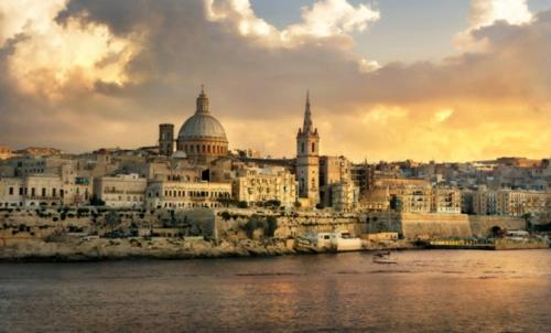 a view of a city from the water at Villa Naxxar Malta in Naxxar