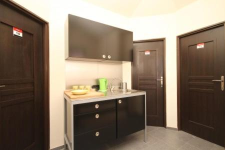Cuina o zona de cuina de Ekonomiczne- Małe Pokoje Gościnne Dask Holiday