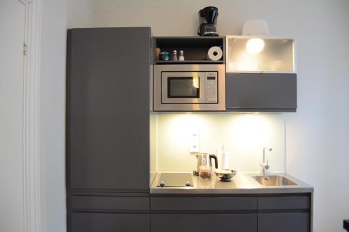 Una cocina o cocineta en DA Hotel Apartments
