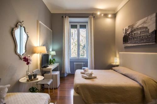 Postel nebo postele na pokoji v ubytování Dulcis In Fundo b&b