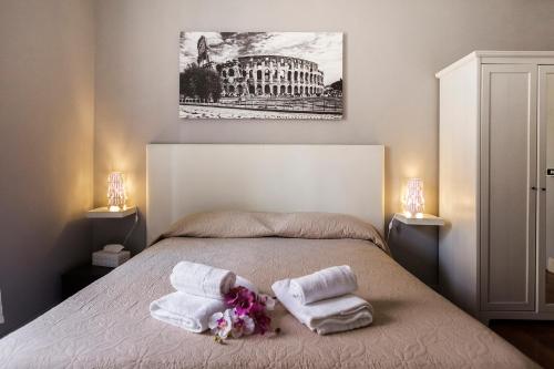 Postel nebo postele na pokoji v ubytování Dulcis In Fundo b&b