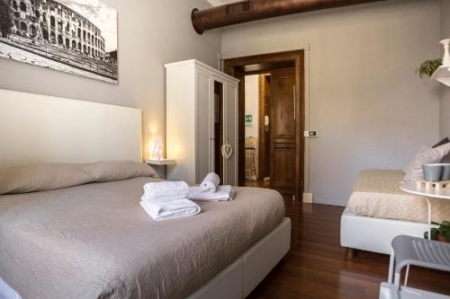 Postel nebo postele na pokoji v ubytování Dulcis In Fundo b&b