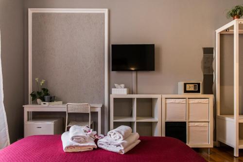 Postel nebo postele na pokoji v ubytování Dulcis In Fundo b&b