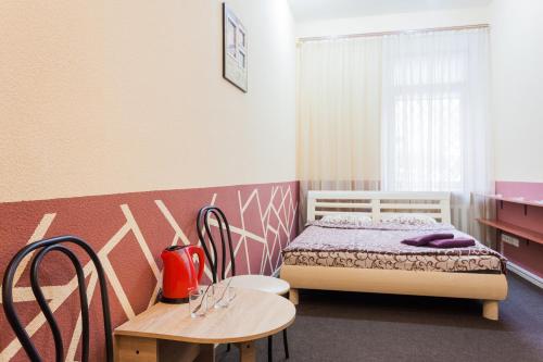 เตียงในห้องที่ Mini-hotel in the heart of Kiev