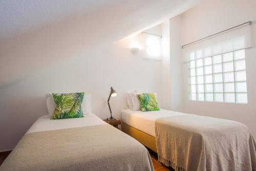 Кровать или кровати в номере Villa Eira