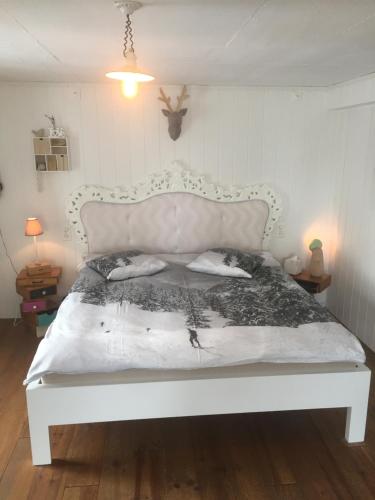 Ein Bett oder Betten in einem Zimmer der Unterkunft Chez Sven - Studio 'Le Grand'
