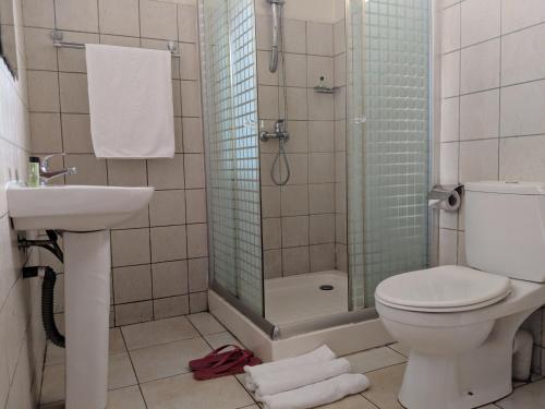 Kylpyhuone majoituspaikassa Prestige Hotel Suites