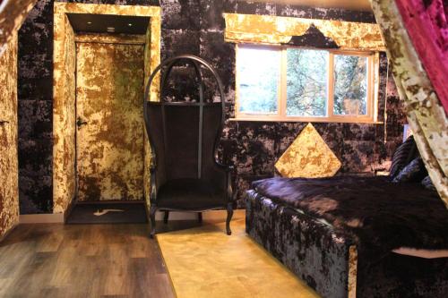 a bedroom with a bed and a window at Who'd A Thought It in Lenham