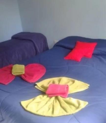Кровать или кровати в номере Cabaña Rosi Ladera Cerro Otto 1 y 2