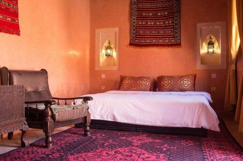 Ein Bett oder Betten in einem Zimmer der Unterkunft Riad Sidi Hicham