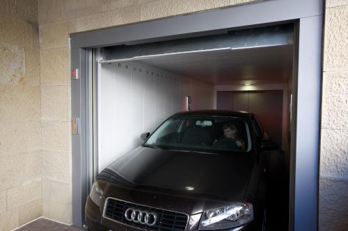 a car is parked inside of a garage at F&G Logroño in Logroño