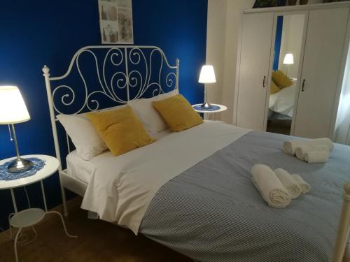 Ένα ή περισσότερα κρεβάτια σε δωμάτιο στο La Dimora dei sette Arcangeli