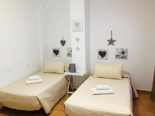 A bed or beds in a room at Apartamento Céntrico Lobos