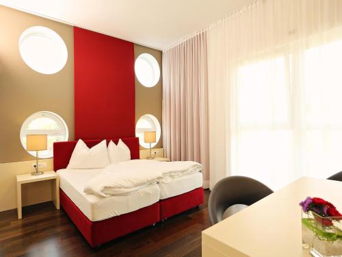 Postel nebo postele na pokoji v ubytování Hotel Royal X