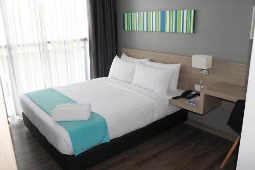 Cama o camas de una habitación en Singgah Kertih