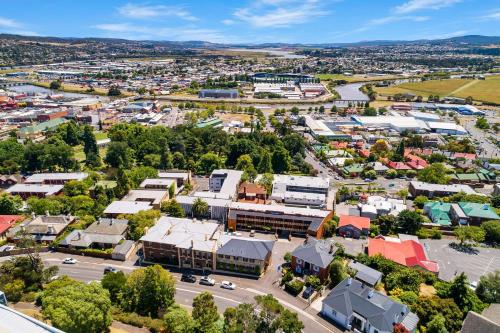 an aerial view of a small town with buildings at Coach House Launceston in Launceston