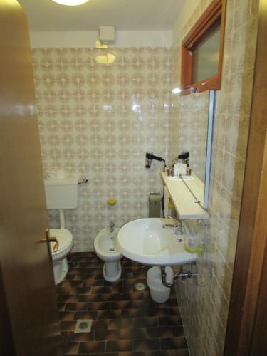 Koupelna v ubytování Hotel Meublè Meridiana