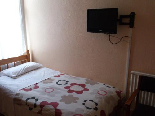 Postel nebo postele na pokoji v ubytování Grafton House