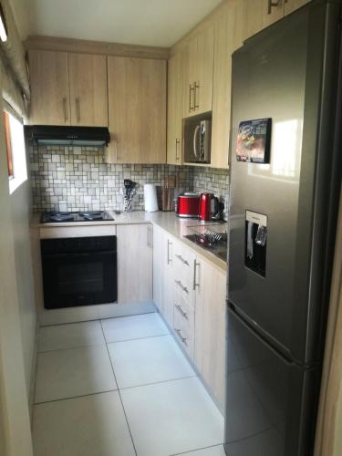 Η κουζίνα ή μικρή κουζίνα στο Dunton Guest House