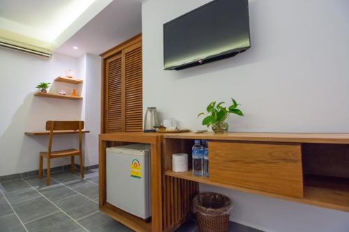Télévision ou salle de divertissement dans l'établissement Neth Socheata Hotel