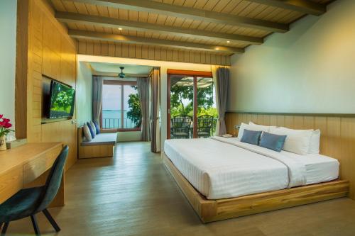 Vuode tai vuoteita majoituspaikassa Coral Cliff Beach Resort Samui - SHA Plus
