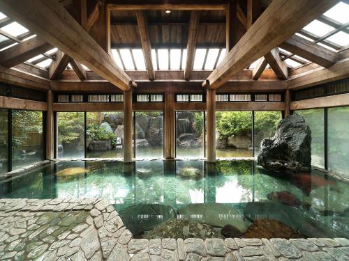 Bazén v ubytování Yuraku Hotel nebo v jeho okolí