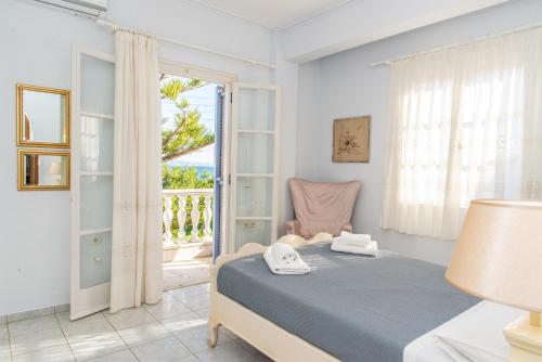 Säng eller sängar i ett rum på Seashore Villa