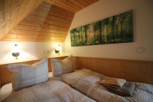 En eller flere senge i et værelse på Villa Belvedere