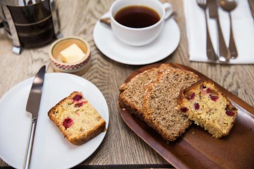 a table with two slices of bread and a cup of coffee at Number 31 in Dublin