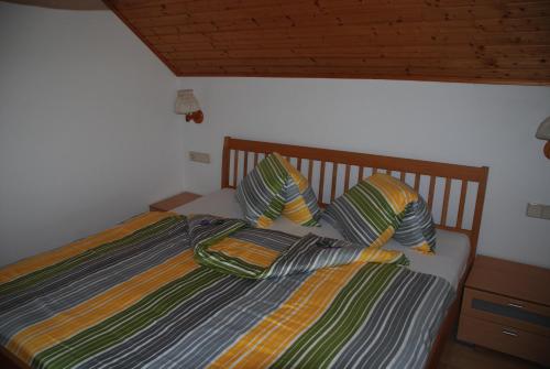 Llit o llits en una habitació de Haus Ase - Urlaub am Bauernhof