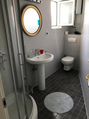 Ванная комната в Apartments Casa Sul Mare