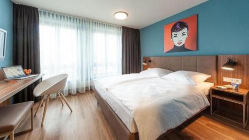 Postel nebo postele na pokoji v ubytování My Südstadt Bonn