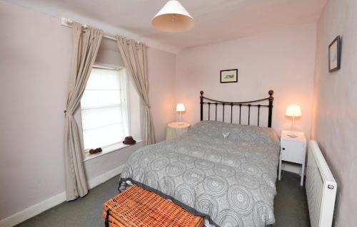 Postel nebo postele na pokoji v ubytování 7 Mersey Street, Borth-y-Gest