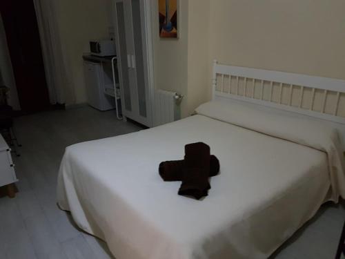 Кровать или кровати в номере PLAZA REDONDA brugada home