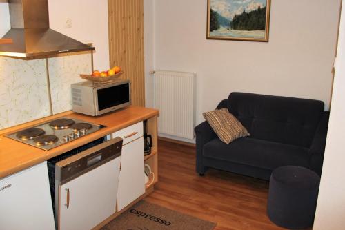 Kuchyň nebo kuchyňský kout v ubytování Apartments Koblar