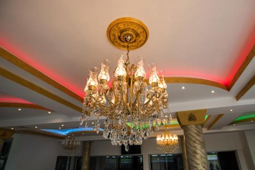 a chandelier hanging from the ceiling of a building at SPA Kompleks Raiski Kat in Dimitrovgrad