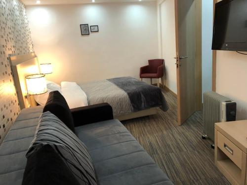 Ένα ή περισσότερα κρεβάτια σε δωμάτιο στο Apartmani Air