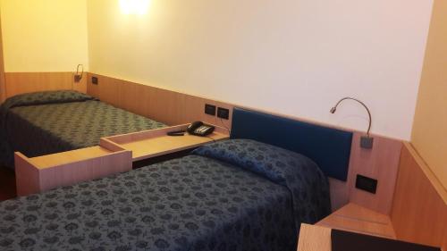 Hotel Esperiaにあるベッド