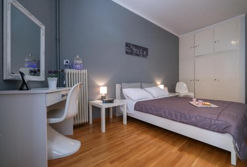 Giường trong phòng chung tại Izabella Guest House